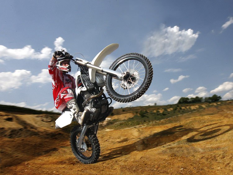 Управлять мотоциклом